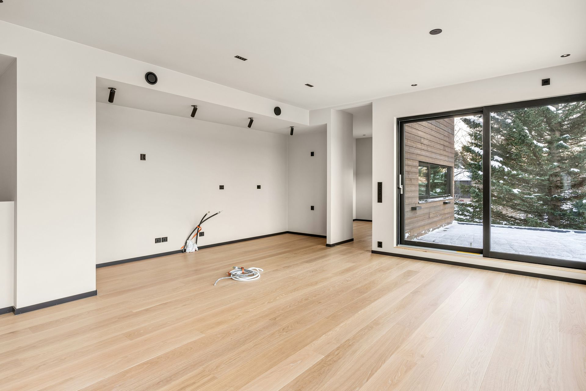 An empty room with a lot of windows